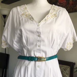 Teal belt with gold buckle